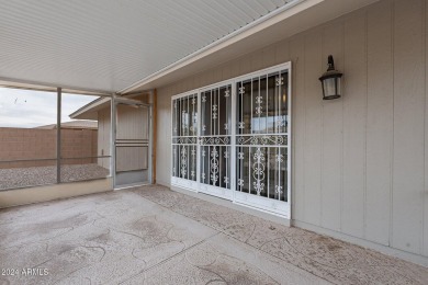 This updated and beautiful 3-bedroom home is move in ready with on Sun City Lakes West and East in Arizona - for sale on GolfHomes.com, golf home, golf lot