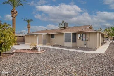 This updated and beautiful 3-bedroom home is move in ready with on Sun City Lakes West and East in Arizona - for sale on GolfHomes.com, golf home, golf lot