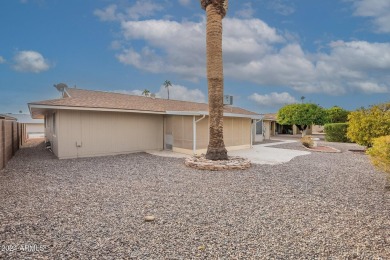 This updated and beautiful 3-bedroom home is move in ready with on Sun City Lakes West and East in Arizona - for sale on GolfHomes.com, golf home, golf lot