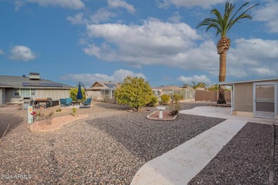 This updated and beautiful 3-bedroom home is move in ready with on Sun City Lakes West and East in Arizona - for sale on GolfHomes.com, golf home, golf lot