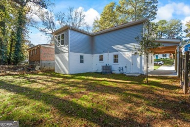 Welcome to your dream home! This completely remodeled two-story on John A. White Golf Course in Georgia - for sale on GolfHomes.com, golf home, golf lot