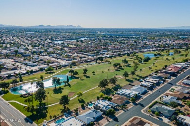 This updated and beautiful 3-bedroom home is move in ready with on Sun City Lakes West and East in Arizona - for sale on GolfHomes.com, golf home, golf lot