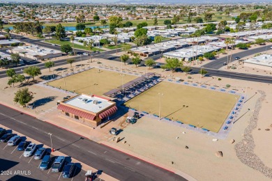 This updated and beautiful 3-bedroom home is move in ready with on Sun City Lakes West and East in Arizona - for sale on GolfHomes.com, golf home, golf lot