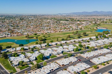 This updated and beautiful 3-bedroom home is move in ready with on Sun City Lakes West and East in Arizona - for sale on GolfHomes.com, golf home, golf lot