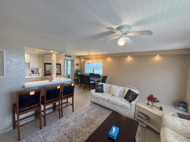 VIEW! VIEW! VIEW! Beautiful waterfront unit! Spacious, Partially on Kings Point Golf -Flanders Way in Florida - for sale on GolfHomes.com, golf home, golf lot