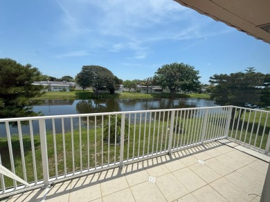 VIEW! VIEW! VIEW! Beautiful waterfront unit! Spacious, Partially on Kings Point Golf -Flanders Way in Florida - for sale on GolfHomes.com, golf home, golf lot