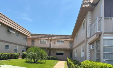 VIEW! VIEW! VIEW! Beautiful waterfront unit! Spacious, Partially on Kings Point Golf -Flanders Way in Florida - for sale on GolfHomes.com, golf home, golf lot
