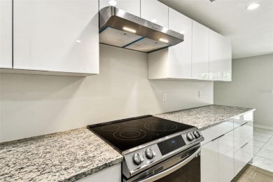 Welcome to this beautifully updated 3-bedroom, 2-bathroom block on Northdale Golf and Tennis Club in Florida - for sale on GolfHomes.com, golf home, golf lot