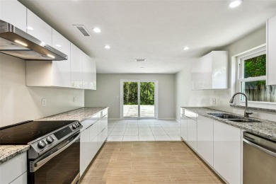 Welcome to this beautifully updated 3-bedroom, 2-bathroom block on Northdale Golf and Tennis Club in Florida - for sale on GolfHomes.com, golf home, golf lot