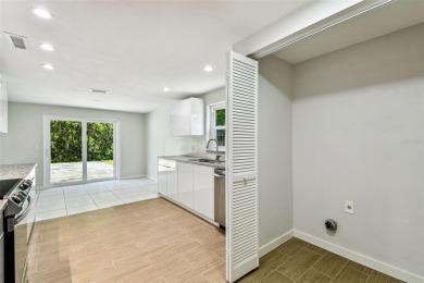 Welcome to this beautifully updated 3-bedroom, 2-bathroom block on Northdale Golf and Tennis Club in Florida - for sale on GolfHomes.com, golf home, golf lot