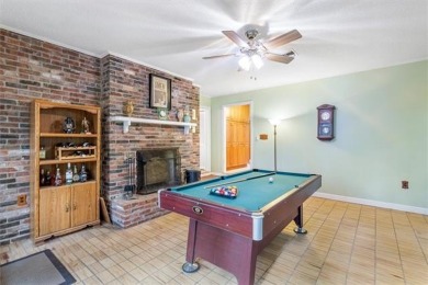 Stately Mid Century Modern 4-bedroom home situated on a wooded on Covington Country Club in Louisiana - for sale on GolfHomes.com, golf home, golf lot