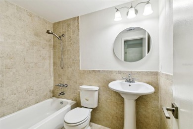 Welcome to this beautifully updated 3-bedroom, 2-bathroom block on Northdale Golf and Tennis Club in Florida - for sale on GolfHomes.com, golf home, golf lot