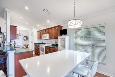 Welcome to your dream villa in the prestigious Colonial Country on Colonial Country Club in Florida - for sale on GolfHomes.com, golf home, golf lot