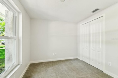 Welcome to this beautifully updated 3-bedroom, 2-bathroom block on Northdale Golf and Tennis Club in Florida - for sale on GolfHomes.com, golf home, golf lot