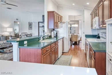 Welcome to your dream villa in the prestigious Colonial Country on Colonial Country Club in Florida - for sale on GolfHomes.com, golf home, golf lot