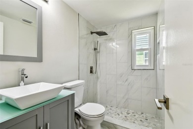 Welcome to this beautifully updated 3-bedroom, 2-bathroom block on Northdale Golf and Tennis Club in Florida - for sale on GolfHomes.com, golf home, golf lot