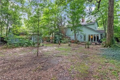 Stately Mid Century Modern 4-bedroom home situated on a wooded on Covington Country Club in Louisiana - for sale on GolfHomes.com, golf home, golf lot