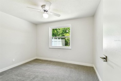 Welcome to this beautifully updated 3-bedroom, 2-bathroom block on Northdale Golf and Tennis Club in Florida - for sale on GolfHomes.com, golf home, golf lot