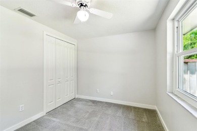 Welcome to this beautifully updated 3-bedroom, 2-bathroom block on Northdale Golf and Tennis Club in Florida - for sale on GolfHomes.com, golf home, golf lot