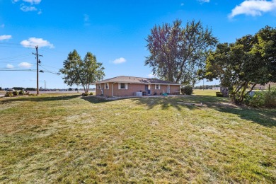 This stunning all-brick ranch home is situated on over an acre on Park Shore Golf Course in Michigan - for sale on GolfHomes.com, golf home, golf lot