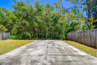 Welcome to this beautifully updated 3-bedroom, 2-bathroom block on Northdale Golf and Tennis Club in Florida - for sale on GolfHomes.com, golf home, golf lot
