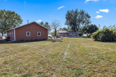 This stunning all-brick ranch home is situated on over an acre on Park Shore Golf Course in Michigan - for sale on GolfHomes.com, golf home, golf lot