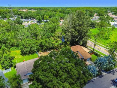 Welcome to this beautifully updated 3-bedroom, 2-bathroom block on Northdale Golf and Tennis Club in Florida - for sale on GolfHomes.com, golf home, golf lot