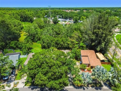 Welcome to this beautifully updated 3-bedroom, 2-bathroom block on Northdale Golf and Tennis Club in Florida - for sale on GolfHomes.com, golf home, golf lot