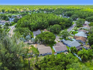 Welcome to this beautifully updated 3-bedroom, 2-bathroom block on Northdale Golf and Tennis Club in Florida - for sale on GolfHomes.com, golf home, golf lot