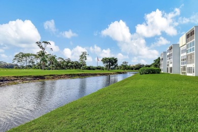 Exceptional unit, fully renovated with great lake and golf views on Oriole Golf and Tennis Club in Florida - for sale on GolfHomes.com, golf home, golf lot