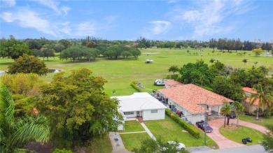 Charming 2-bedroom, 2 bath home located in the desirable Miami on Miami Springs Golf and Country Club in Florida - for sale on GolfHomes.com, golf home, golf lot