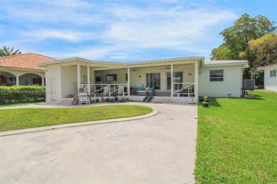 Charming 2-bedroom, 2 bath home located in the desirable Miami on Miami Springs Golf and Country Club in Florida - for sale on GolfHomes.com, golf home, golf lot