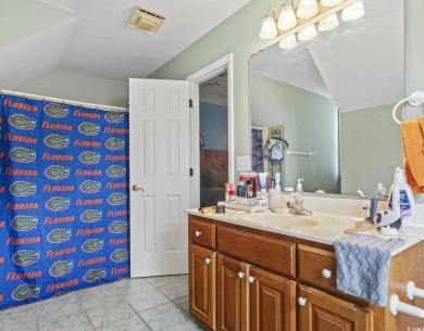 Perfectly positioned on a sprawling 0.76-acre lot overlooking on Myrtlewood Golf Course and Club  in South Carolina - for sale on GolfHomes.com, golf home, golf lot