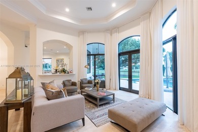 Luxury residence with panoramic golf views in the exclusive on Weston Hills Country Club in Florida - for sale on GolfHomes.com, golf home, golf lot