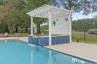Perfectly positioned on a sprawling 0.76-acre lot overlooking on Myrtlewood Golf Course and Club  in South Carolina - for sale on GolfHomes.com, golf home, golf lot