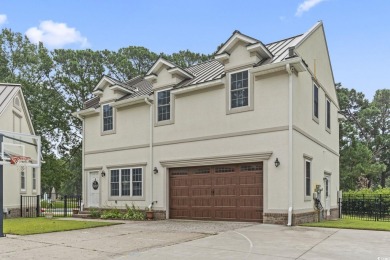 Perfectly positioned on a sprawling 0.76-acre lot overlooking on Myrtlewood Golf Course and Club  in South Carolina - for sale on GolfHomes.com, golf home, golf lot