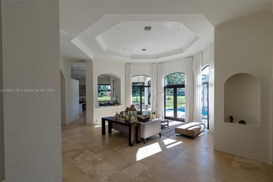 Luxury residence with panoramic golf views in the exclusive on Weston Hills Country Club in Florida - for sale on GolfHomes.com, golf home, golf lot