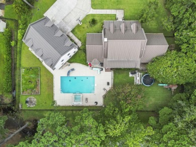 Perfectly positioned on a sprawling 0.76-acre lot overlooking on Myrtlewood Golf Course and Club  in South Carolina - for sale on GolfHomes.com, golf home, golf lot
