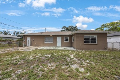 Lakewood Estates Mid-Century Gem - Solid Home, Prime Location on St. Petersburg Country Club in Florida - for sale on GolfHomes.com, golf home, golf lot