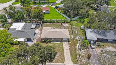 Lakewood Estates Mid-Century Gem - Solid Home, Prime Location on St. Petersburg Country Club in Florida - for sale on GolfHomes.com, golf home, golf lot