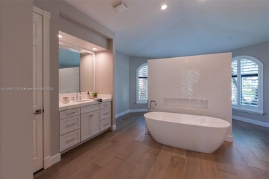 Luxury residence with panoramic golf views in the exclusive on Weston Hills Country Club in Florida - for sale on GolfHomes.com, golf home, golf lot