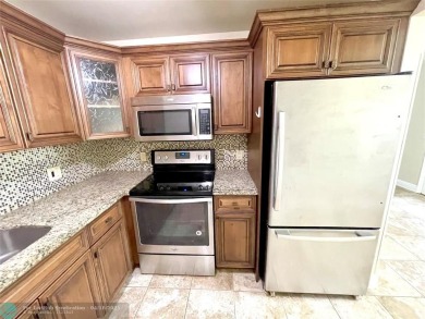 1ST FLOOR CONDO CAN BE RENTED RIGHT AWAY, 2 BEDROOM 1 1/5 on Flamingo Lakes Country Club in Florida - for sale on GolfHomes.com, golf home, golf lot