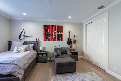 Luxury residence with panoramic golf views in the exclusive on Weston Hills Country Club in Florida - for sale on GolfHomes.com, golf home, golf lot