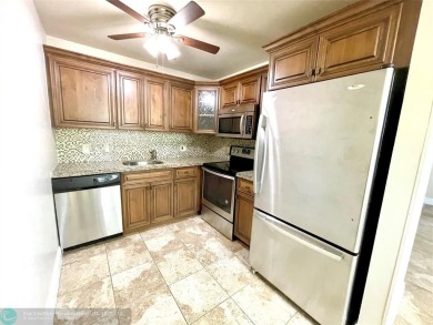 1ST FLOOR CONDO CAN BE RENTED RIGHT AWAY, 2 BEDROOM 1 1/5 on Flamingo Lakes Country Club in Florida - for sale on GolfHomes.com, golf home, golf lot