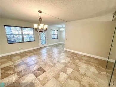 1ST FLOOR CONDO CAN BE RENTED RIGHT AWAY, 2 BEDROOM 1 1/5 on Flamingo Lakes Country Club in Florida - for sale on GolfHomes.com, golf home, golf lot