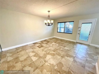 1ST FLOOR CONDO CAN BE RENTED RIGHT AWAY, 2 BEDROOM 1 1/5 on Flamingo Lakes Country Club in Florida - for sale on GolfHomes.com, golf home, golf lot