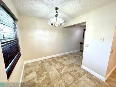 1ST FLOOR CONDO CAN BE RENTED RIGHT AWAY, 2 BEDROOM 1 1/5 on Flamingo Lakes Country Club in Florida - for sale on GolfHomes.com, golf home, golf lot