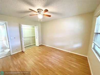 1ST FLOOR CONDO CAN BE RENTED RIGHT AWAY, 2 BEDROOM 1 1/5 on Flamingo Lakes Country Club in Florida - for sale on GolfHomes.com, golf home, golf lot