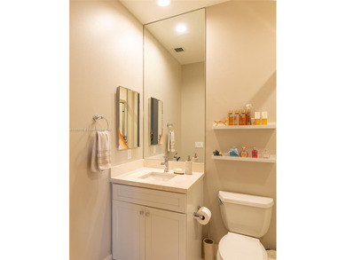 Luxury residence with panoramic golf views in the exclusive on Weston Hills Country Club in Florida - for sale on GolfHomes.com, golf home, golf lot