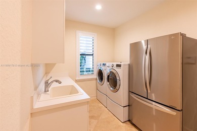 Luxury residence with panoramic golf views in the exclusive on Weston Hills Country Club in Florida - for sale on GolfHomes.com, golf home, golf lot